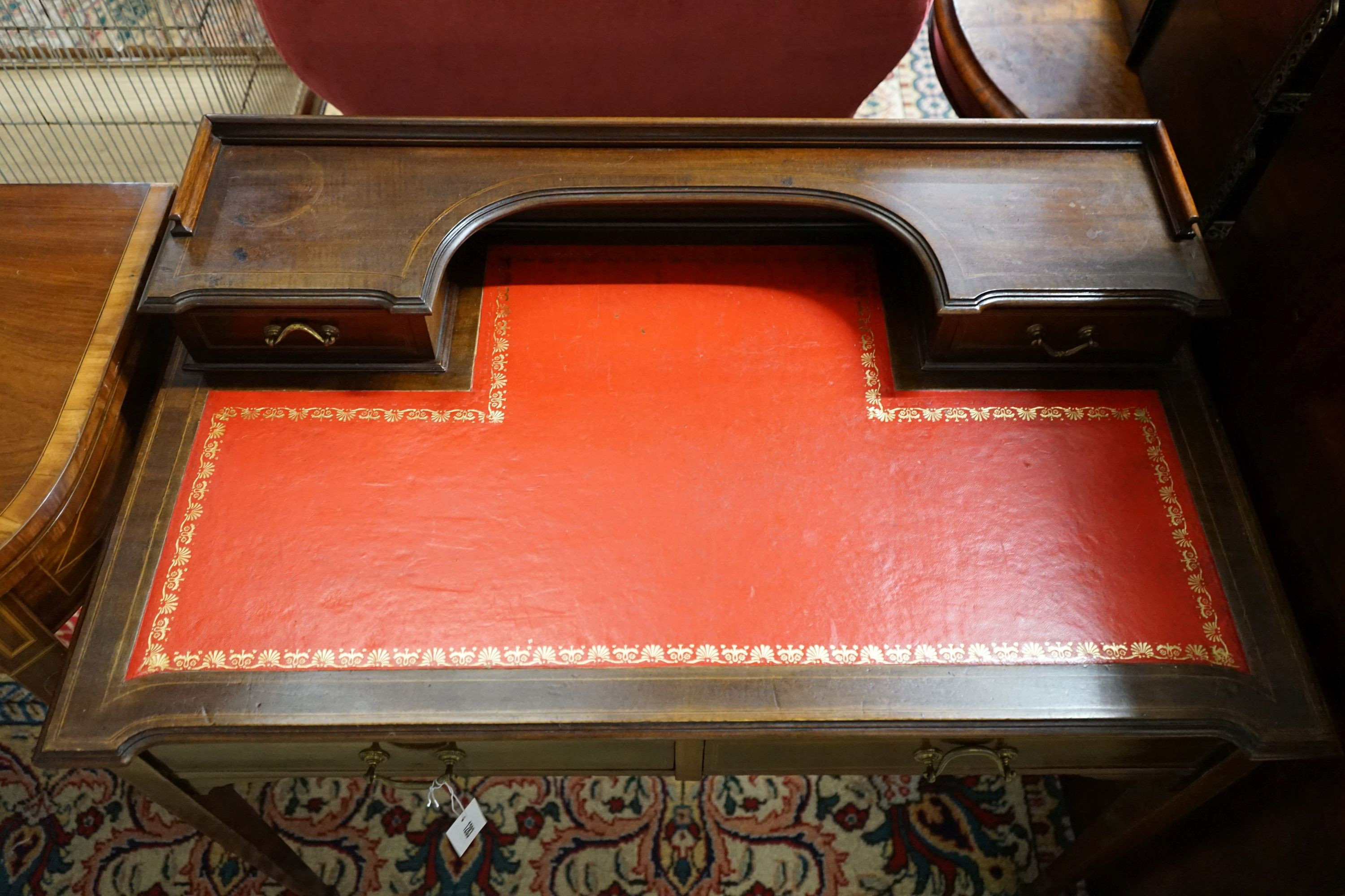 An Edwardian banded mahogany writing table, width 91cm, depth 52cm, height 83cm